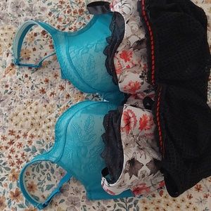 Cacique bundle of 3 bras. One molded, one push up, and one balconett.